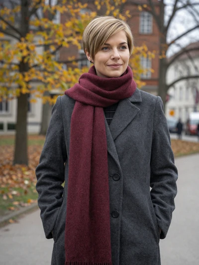 Klara, 32, German woman with pixie-cut blonde hair in a Munich autumn park