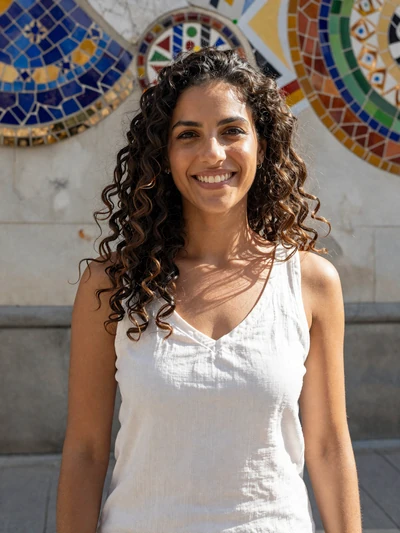 Elena, 28, Spanish woman on a sunny Barcelona street open to serious dating